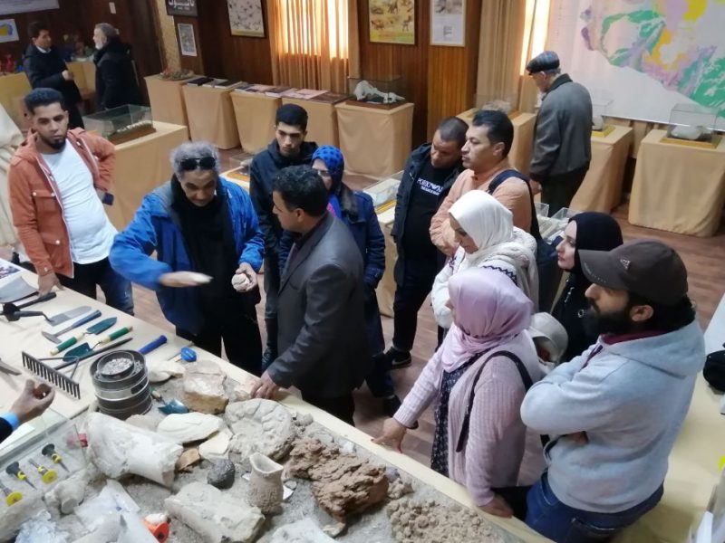 Ahmed al Asker and Professor Salem guide the group through the Dinosaur Museum.