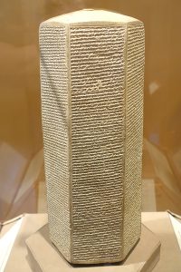 Six-sided clay prism with written accounts of the military campaigns of Sennacherib. Held by the Institute for the Study of Ancient Cultures (ISAC). Photo: Daderot / Wikimedia Commons. CC0 1.0 DEED