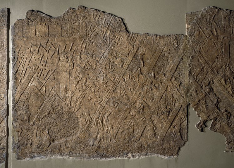 Gypsum wall panel relief showing an assault on Lachish. From the Southwest Palace at Nineveh, reign of Sennacherib (c. 700 – 692). British Museum 124906. Photo © The Trustees of the British Museum