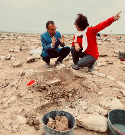 Dr. Sconzo consults with a one of the project's partners from the Duhok Directorate of Antiquities and Heritage.