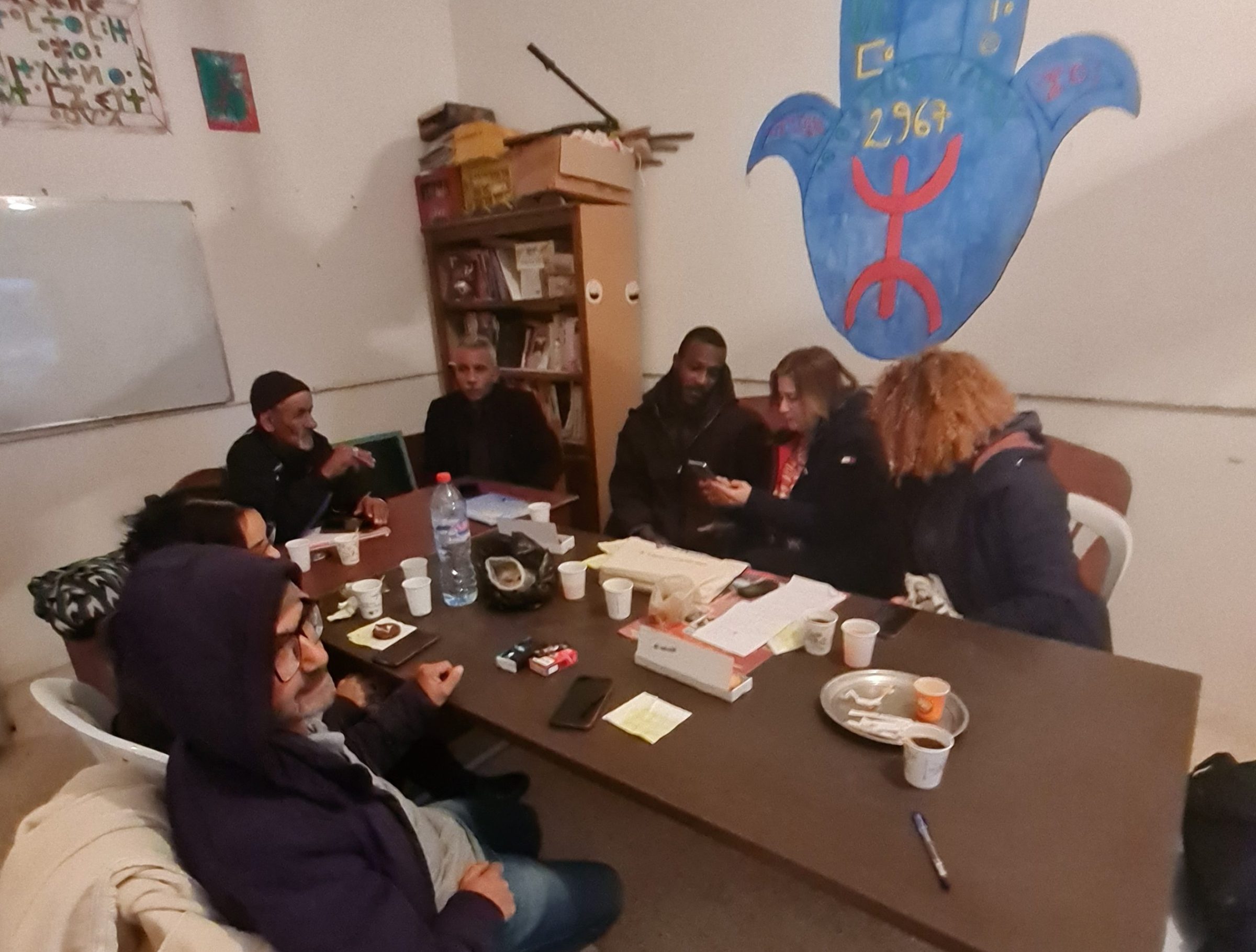 Fig. 3. Faten Bouchrara and Saoussen Nighaoui train members of the Black Tunisian community on using KoboToolBox and KoboCollect to document their tangible heritage (Photo Ahmed Metoui).