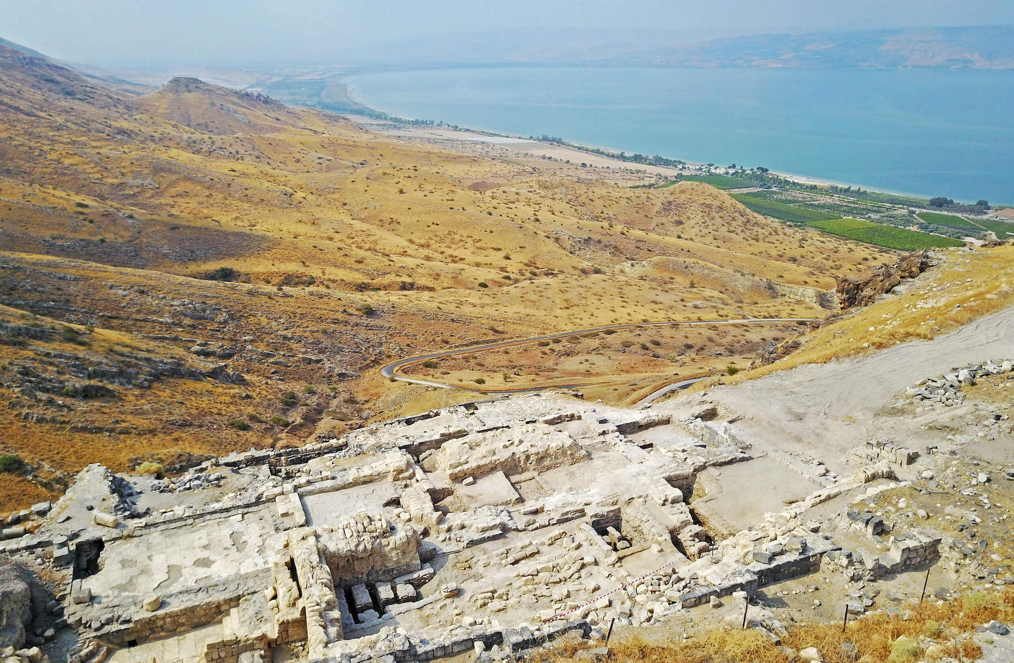 Fig. 1: The ruins of the 2nd to 4th century CE Southern Bathhouse at Hippos and the view towards the Sea of Galilee (credit: Michael Eisenberg).