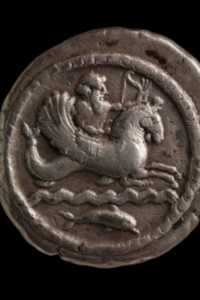 Reverse of a Silver coin from Tyre depicting a “Marine God” on a hippokampos (seahorse). Ca. 360–350 BCE. © The Trustees of the British Museum.