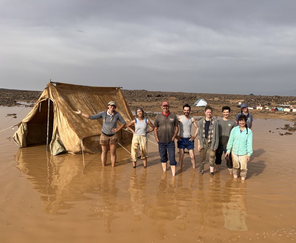Photo 2: The flood that followed after over two inches of rain fell in the desert meant we had to quickly, but successfully, evacuate the kitchen tent before our food stores were ruined. Photo by Dr. Chad Hill, Kites in Context.