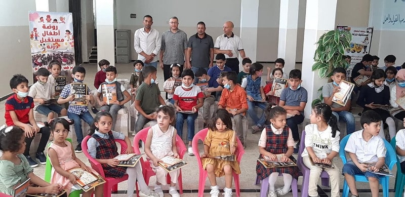 Younis (far left), seen here during ASOR's AFCP project in 2021, also made regular contributions to heritage outreach efforts in eastern Libya.