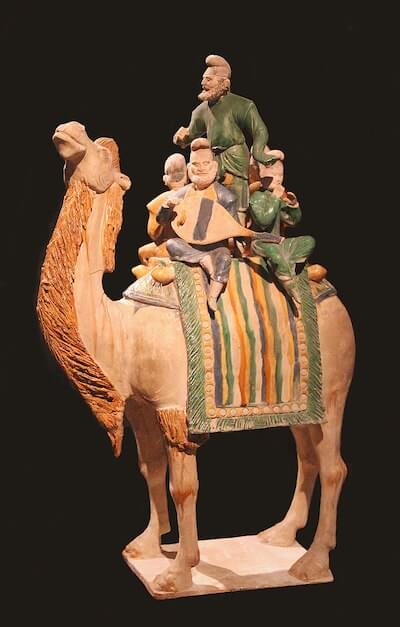 A Tang Dynasty sculpture depicting Sogdian musicians on a camel, ca. 723 CE. Height: 58.4 cm. National Museum of China, Beijing (CC0 1.0).