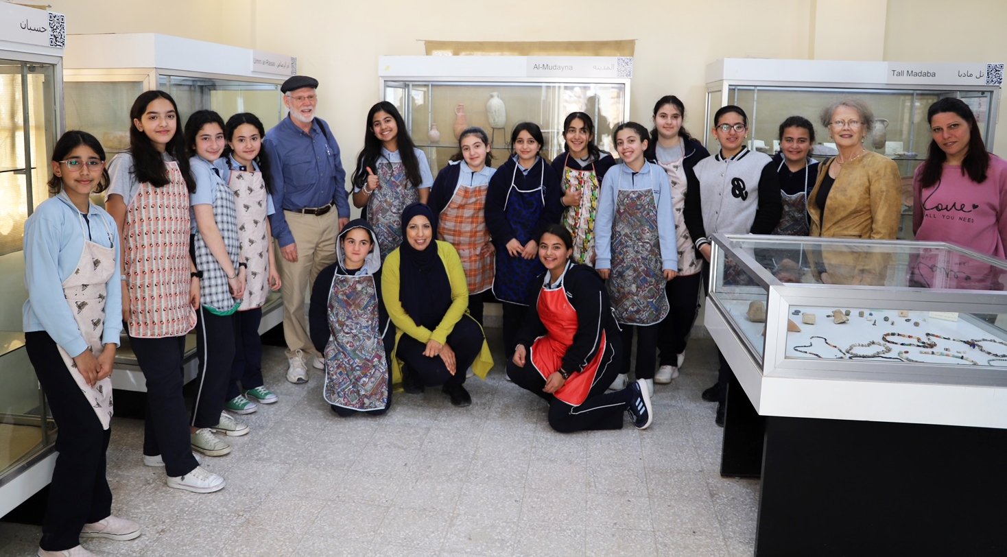 Fig 6: Class photo with, from right, Suzanne Richard, second from right; Huda Amarin, center kneeling; Doug Clark, fifth from left