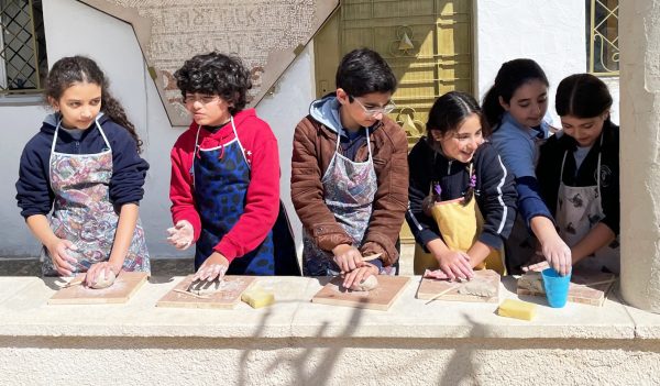 Fig 10: School kids working with clay in class