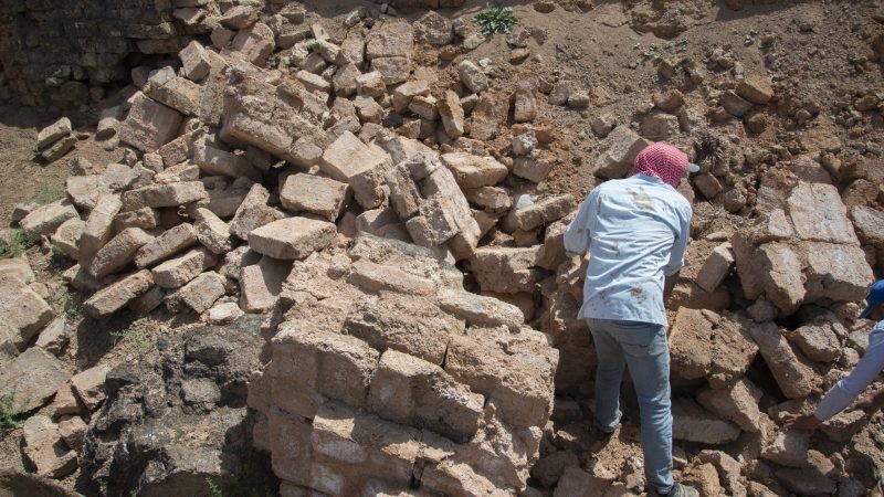 The collapsed eastern wall of the Middle Bronze Age palace (ca. 1800-1600 BC)