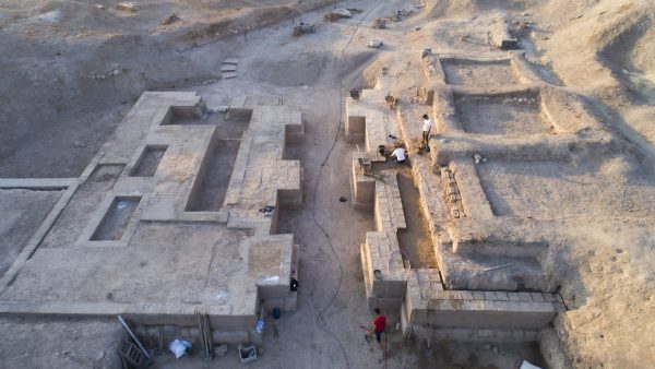 Aerial view of the tripartite gate complex, mud brick capping in progress