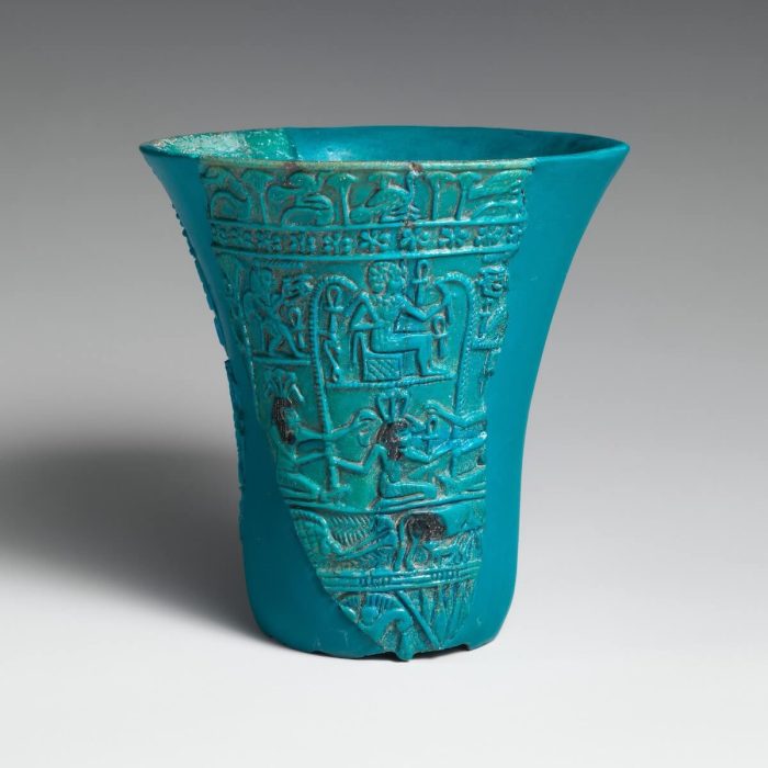 Chalice in the shape of a lotus with relief decoration depicting a youthful king enthroned in the marshes, reborn as a child of the sun god. From Egypt in the 3rd Intermediate Period (ca 1070 – 664 B.C.). Following the collapse of the 20th Dynasty in the 11th century BC, royal imagery evolved, appearing more widely in decorative arts. Popular iconography such as divine infant, marshes, the rising sun, or the lotus blossom communicated the idea of rebirth and rejuvenation. Photo: Metropolitan Museum of Art.