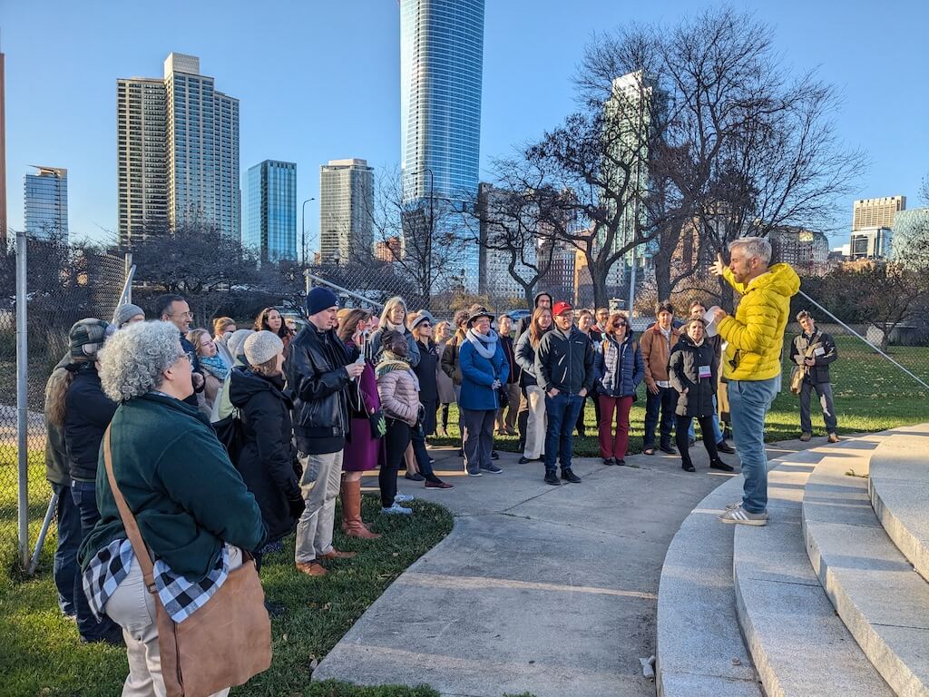 James Osborne and ASOR workshop participants in front of the empty Columbus plinth during the (Re)Visiting the Past in the Present: Monuments in Place workshop. Photo by M.M. Kersel.