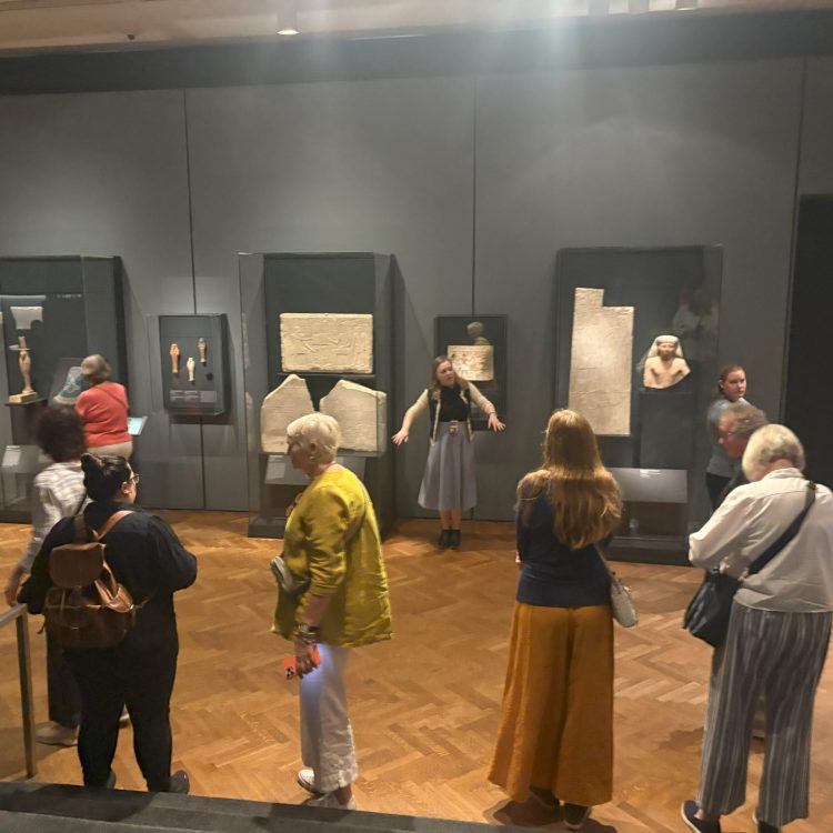 Ashley Arico shows off the Egyptian gallery at the Art Institute to the Friends of ASOR, Sept. 19, 2025.